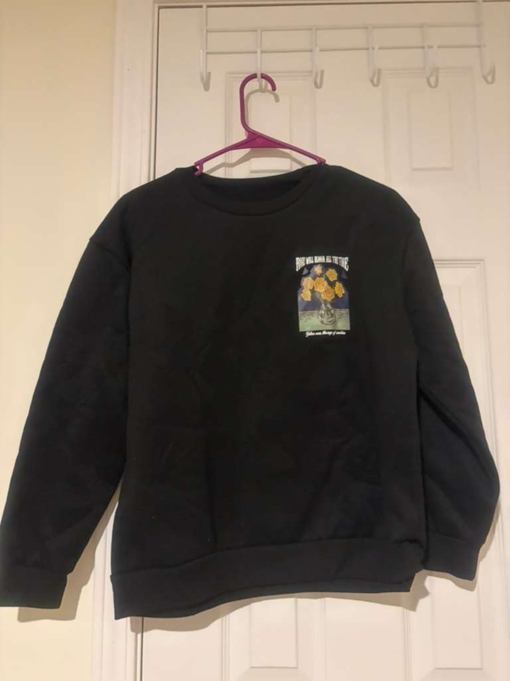 Black Crewneck Sweater with Sunflower Graphic